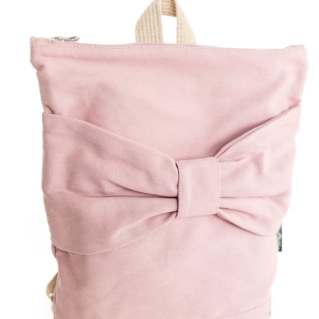 3. Close-up of Muni kids pink bow backpack showing large bow detail