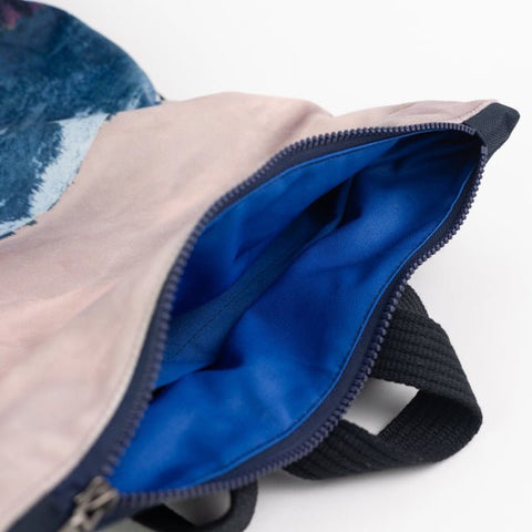 5. Close-up of Muni Blue Mountains backpack interior with blue lining and zipper closure