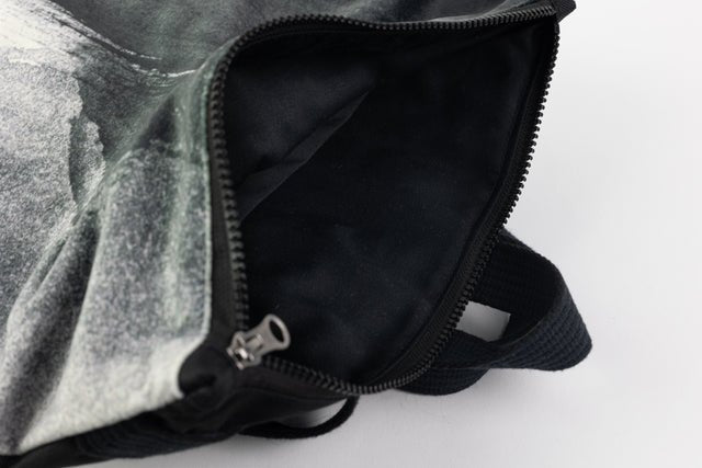 7. Close-up of Muni Black Watercolor backpack zipper and interior