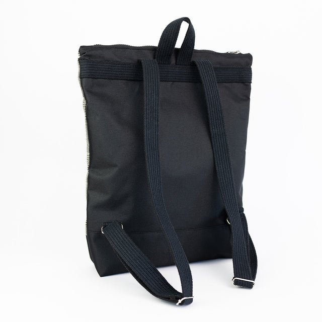 8. Back view of MUNI Tartan Backpack, showing adjustable black straps