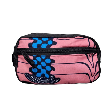 1. Drinbags TAIL OF THE WHALE dog treat bag in pink with blue pattern, front view showing spacious main pocket and secure front pocket