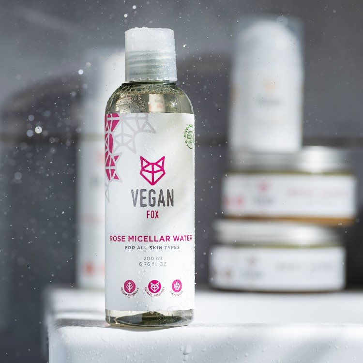 6. Vegan Fox Rose Micellar Water bottle with water droplets, showcasing refreshing properties