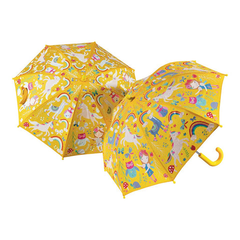 1. Children's yellow umbrella with colorful rainbow and fairy motifs, featuring a curved handle and Velcro fastener, designed to change colors in the rain, shown open on a white background.