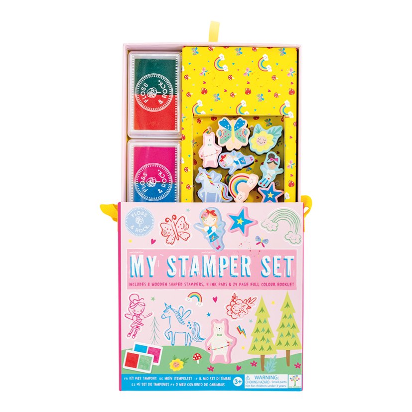 2. Open Floss & Rock My Stamper Set showing ink pads, stampers, and booklet in colorful packaging