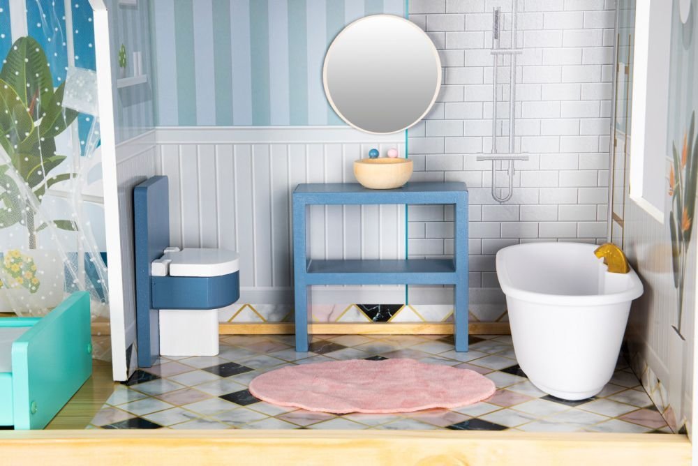 3. Close-up of dollhouse bathroom with bathtub, sink, and mirror, featuring blue and white decor