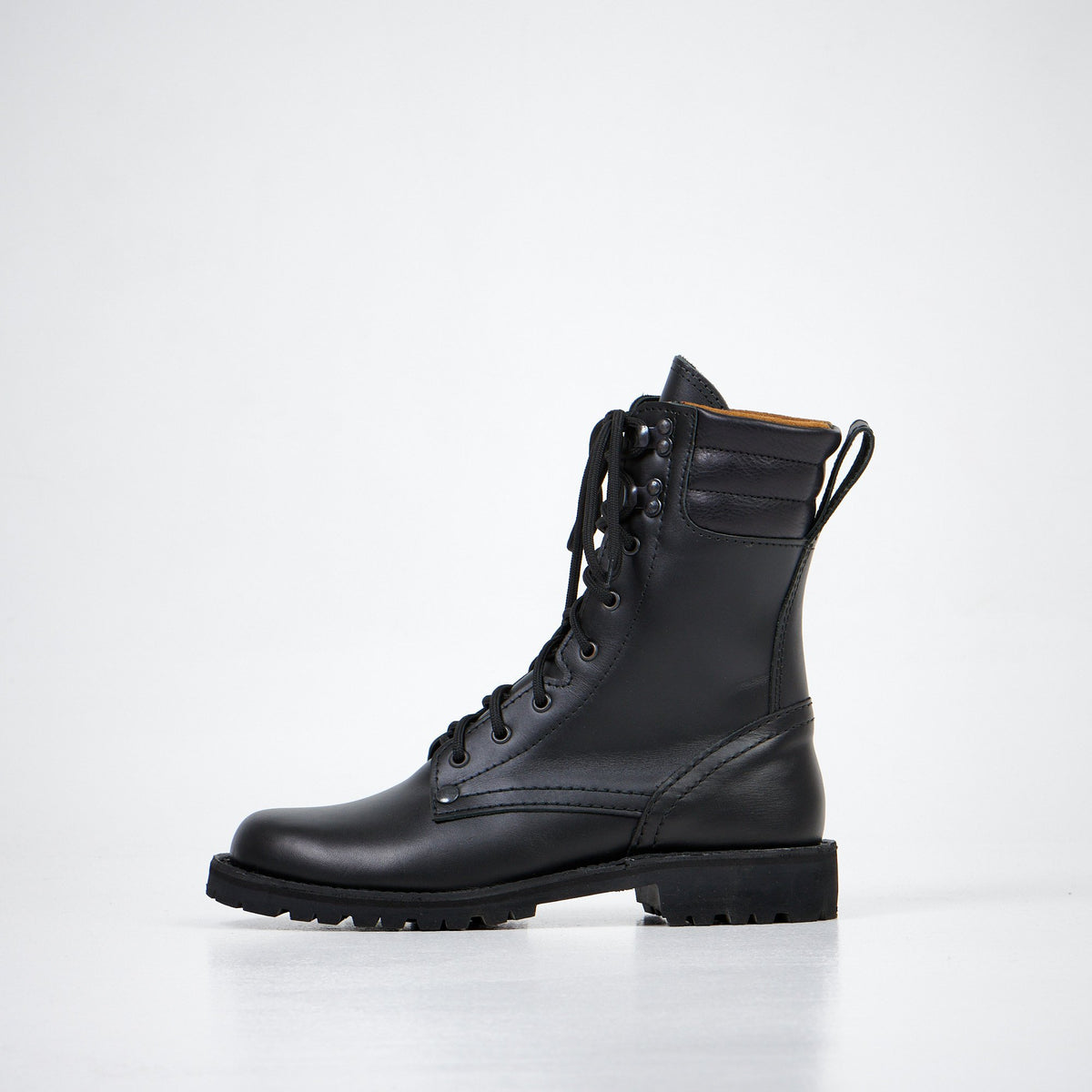 2. Aipi AIPI-1 handmade leather boots in black, front angled view showcasing handcrafted leather and versatile design
