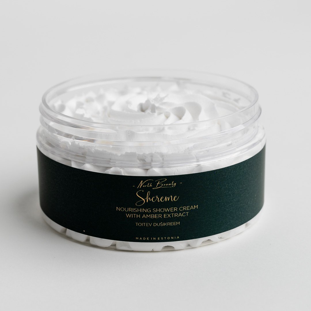 4. Close-up of North Beauty Nourishing Shower Cream with Amber Extract, showcasing whipped texture