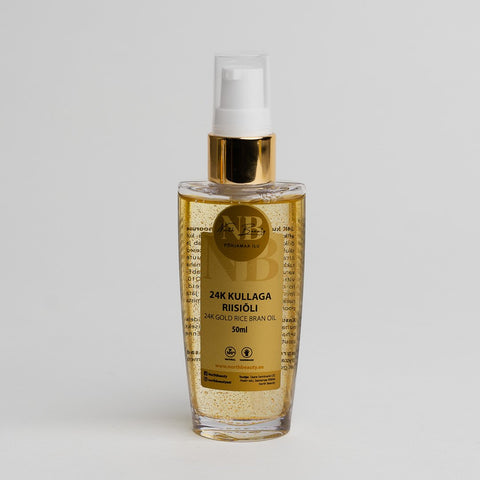 2. Studio shot of North Beauty 24K Gold Rice Oil 50ml with clear label and gold accents