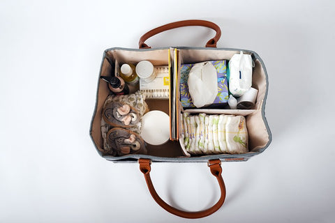 3. Top view of Ally Scandic diaper caddy organizer with multiple compartments and baby items