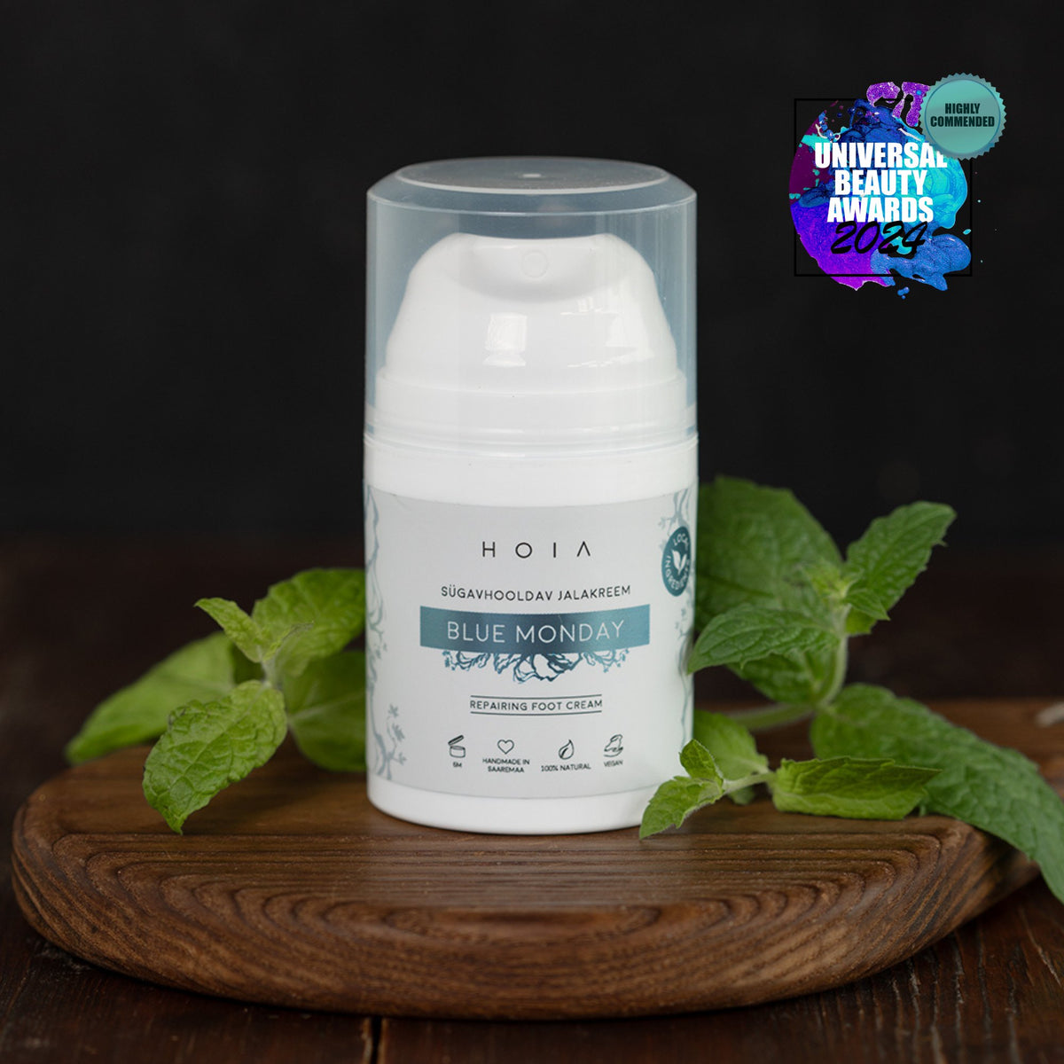 2. HOIA homespa Deep Care Foot Cream BLUE MONDAY, 50ml, with mint leaves and award badge, studio setting