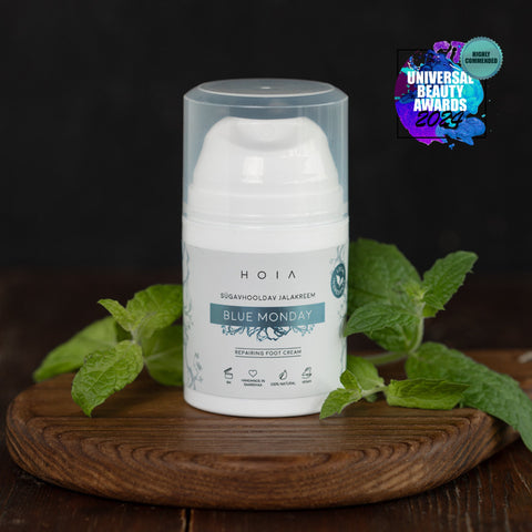 2. HOIA homespa Deep Care Foot Cream BLUE MONDAY, 50ml, with mint leaves and award badge, studio setting