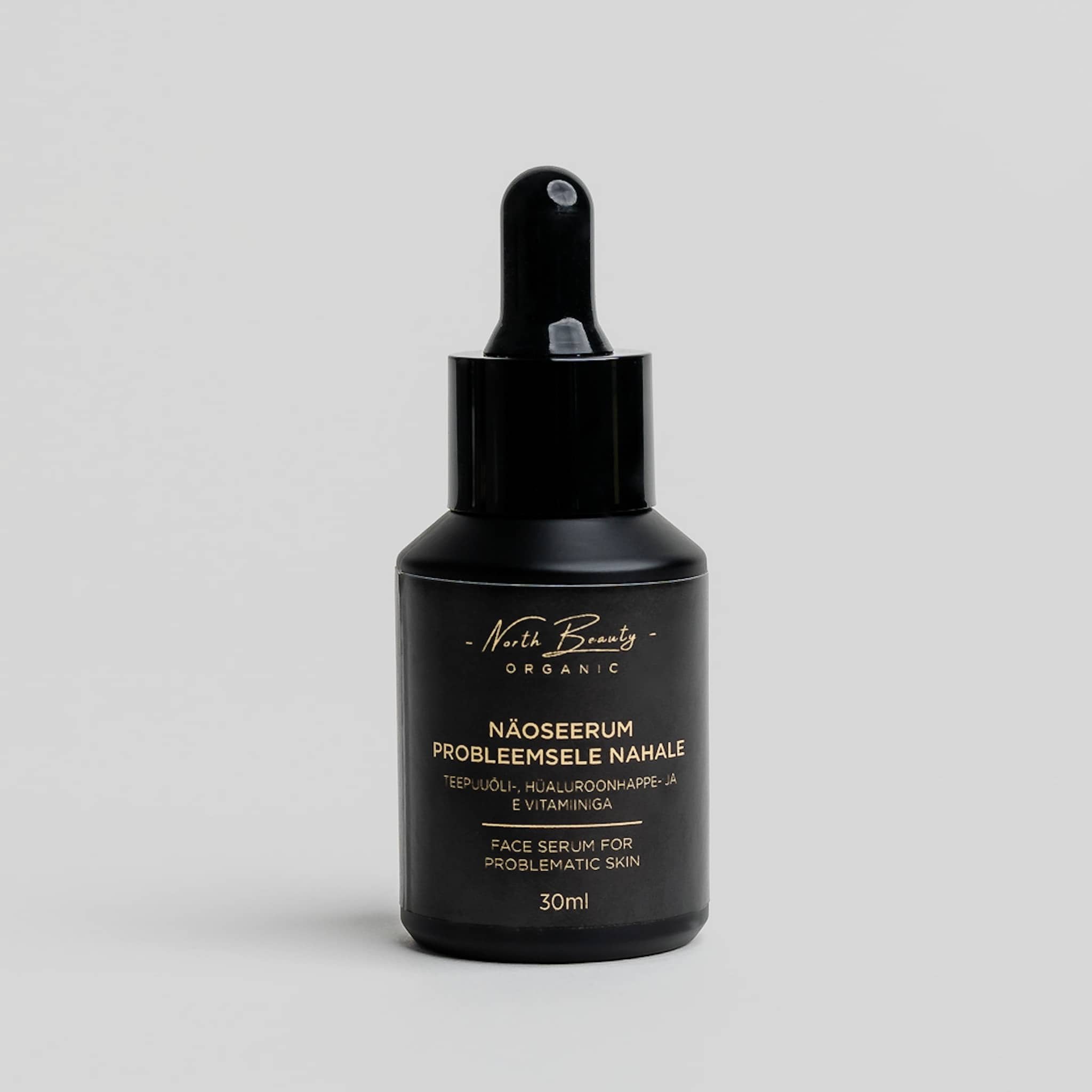 1. North Beauty facial serum for problematic skin for men, 30ml bottle, featuring quick absorption and natural ingredients, shown in studio setting
