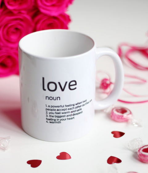 4. SEIK Design Mug with 'Love' definition, shown outside packaging with pink roses and heart decorations