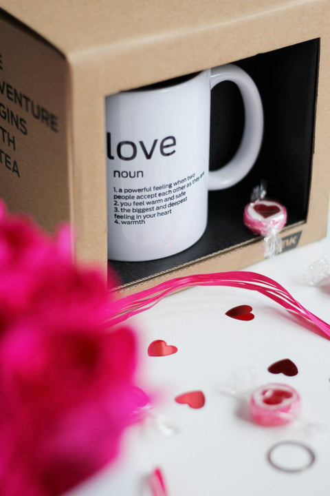 3. SEIK Design Mug featuring 'Love' definition, displayed in box with pink accents and heart candies