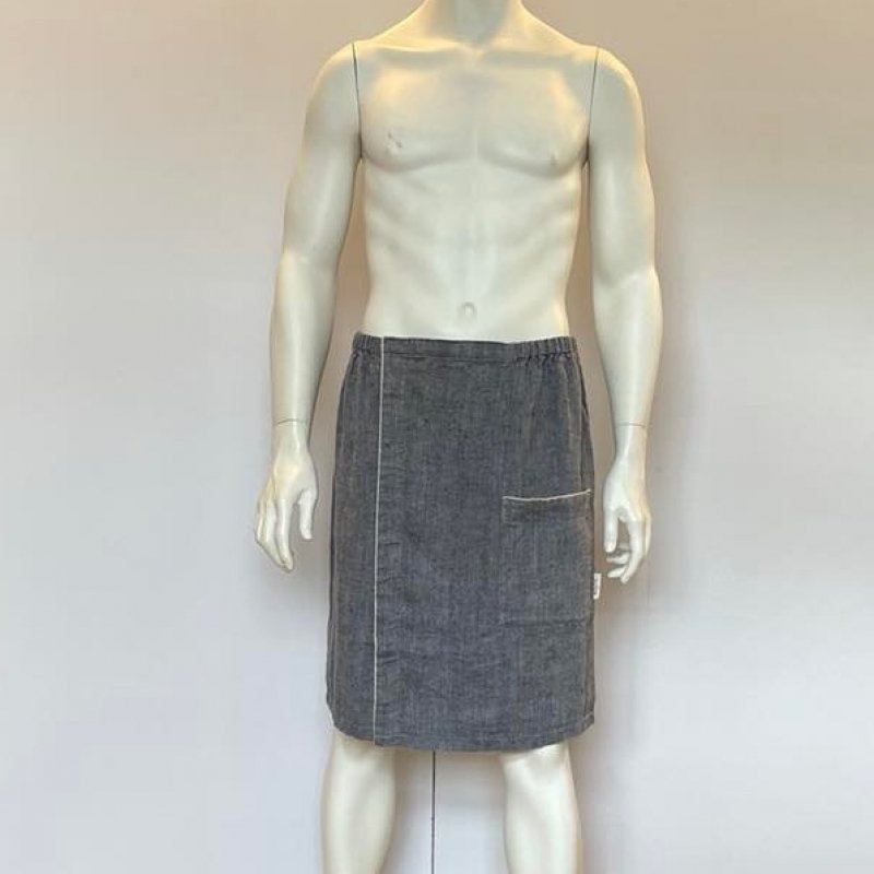 1. Men's grayish blue linen sauna skirt with fishbone pattern shown on mannequin in studio setting