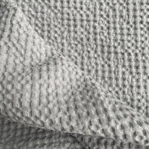 4. Close-up of gray waffle fabric texture highlighting linen and cotton blend