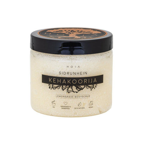 1. HOIA homespa lemongrass body scrub in clear jar with black lid, featuring natural and vegan labels, studio shot