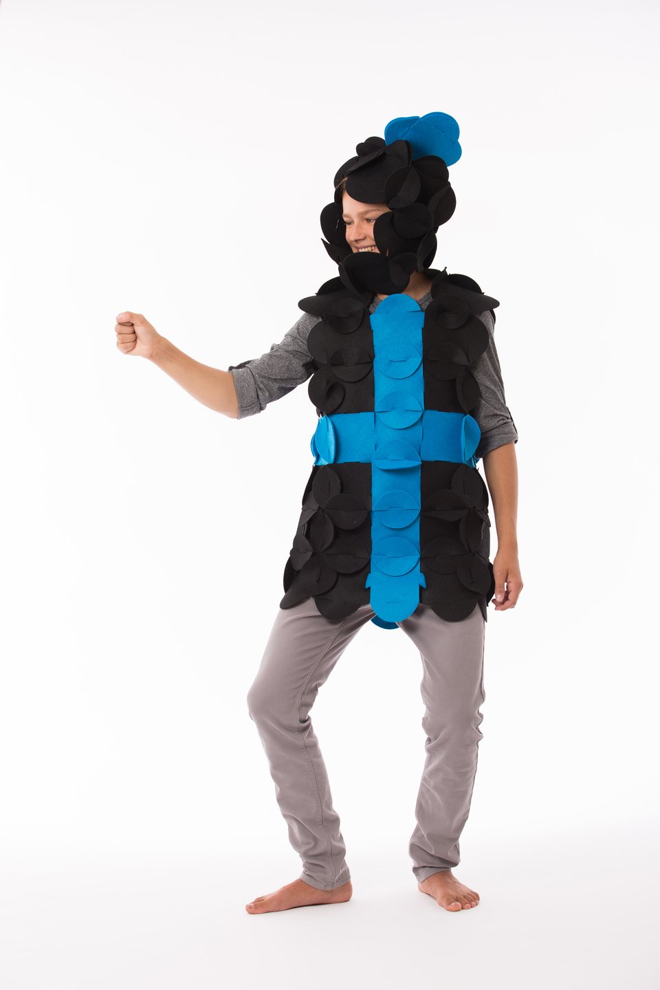 2. Child wearing Sir William the Brave Knight costume with black and blue felt modules in a playful pose