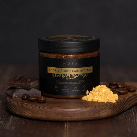 1. HOIA homespa Exfoliating Chocolate Ritual Body Mask 200ML displayed with chocolate pieces and coffee beans on a wooden board
