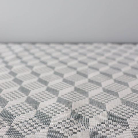 3. Close-up of Virumaa folk art pattern on grey and white table runner