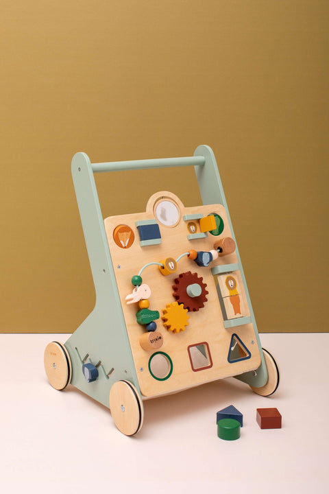 4. Trixie Baby Wooden Activity Walker with colorful shapes and animal designs against a beige background