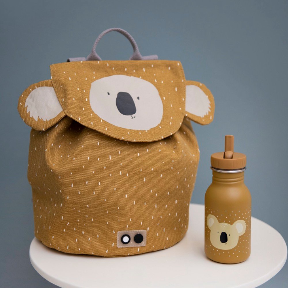 1. Trixie Baby Mini Drawstring Backpack Mr Koala with matching water bottle on white table against blue background