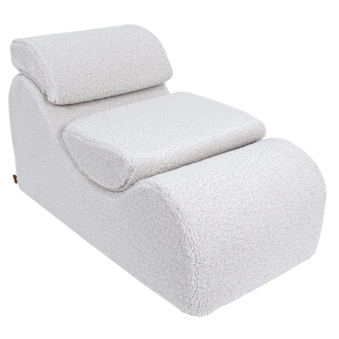 1. White Wave Lounger with ergonomic design and removable headrest, shown in a studio setting
