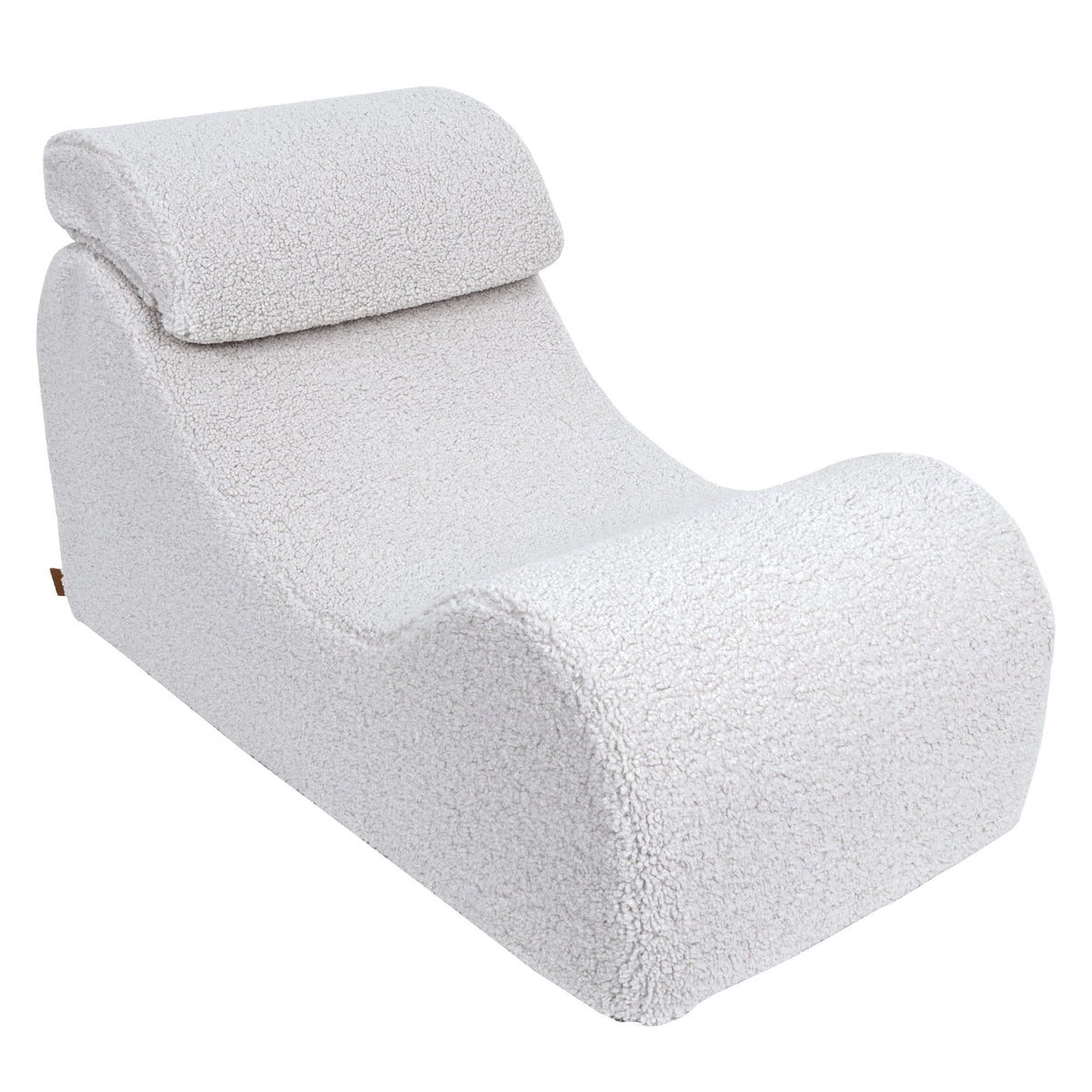 8. White Wave Lounger with headrest, emphasizing its ergonomic design in a studio setting