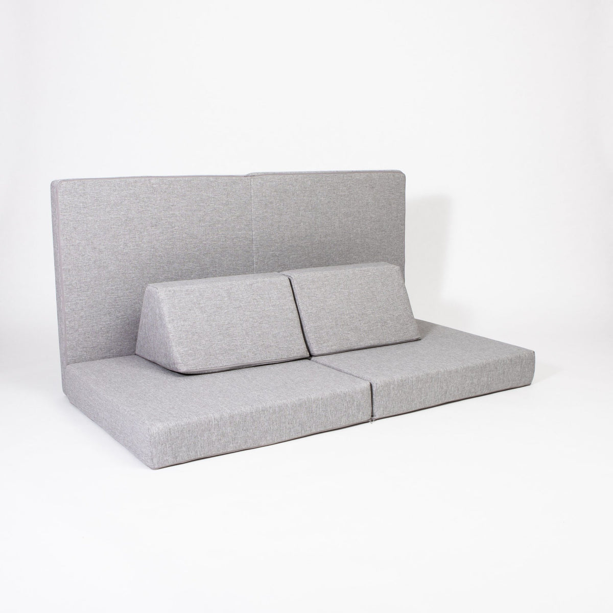 2. Grey Monboxy activity play mattress set with trapezoidal pillows on white background