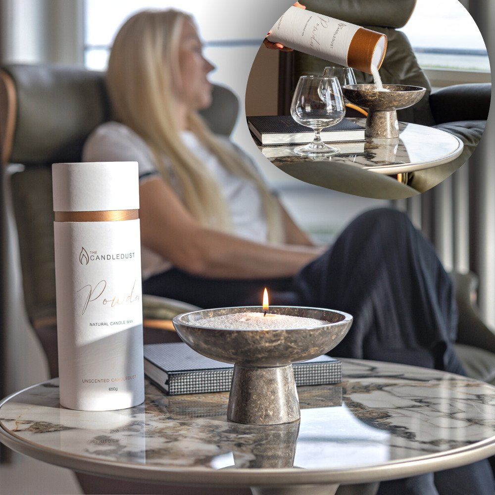 2. Woman pouring Candledust powdered candle into a decorative bowl, with product packaging visible