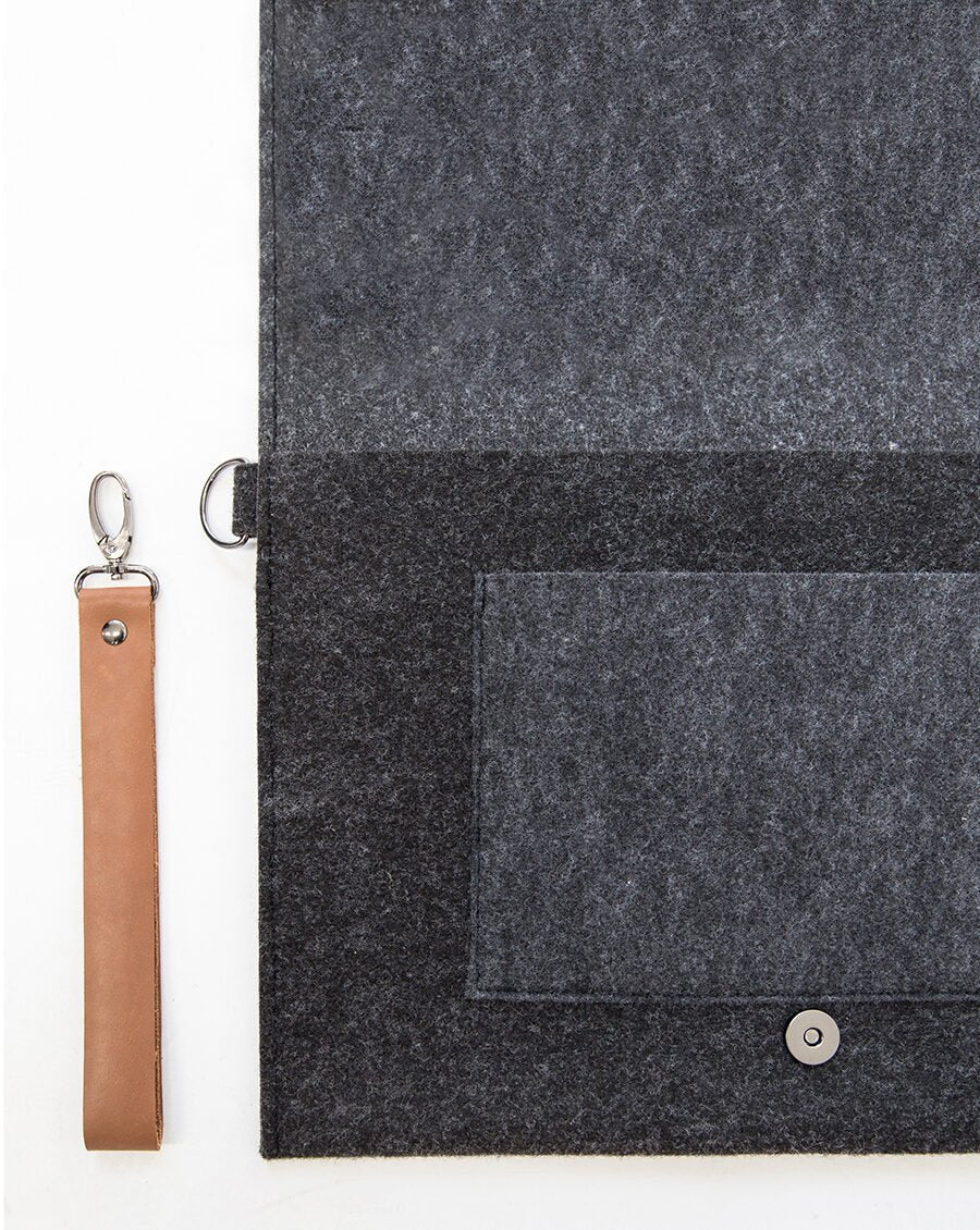 5. Close-up of Nordhale Berg 13-inch laptop bag showing magnetic snap closure and wristband