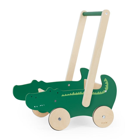 2. Trixie Baby Wooden Cart with crocodile design in green and natural wood, shown in studio setting
