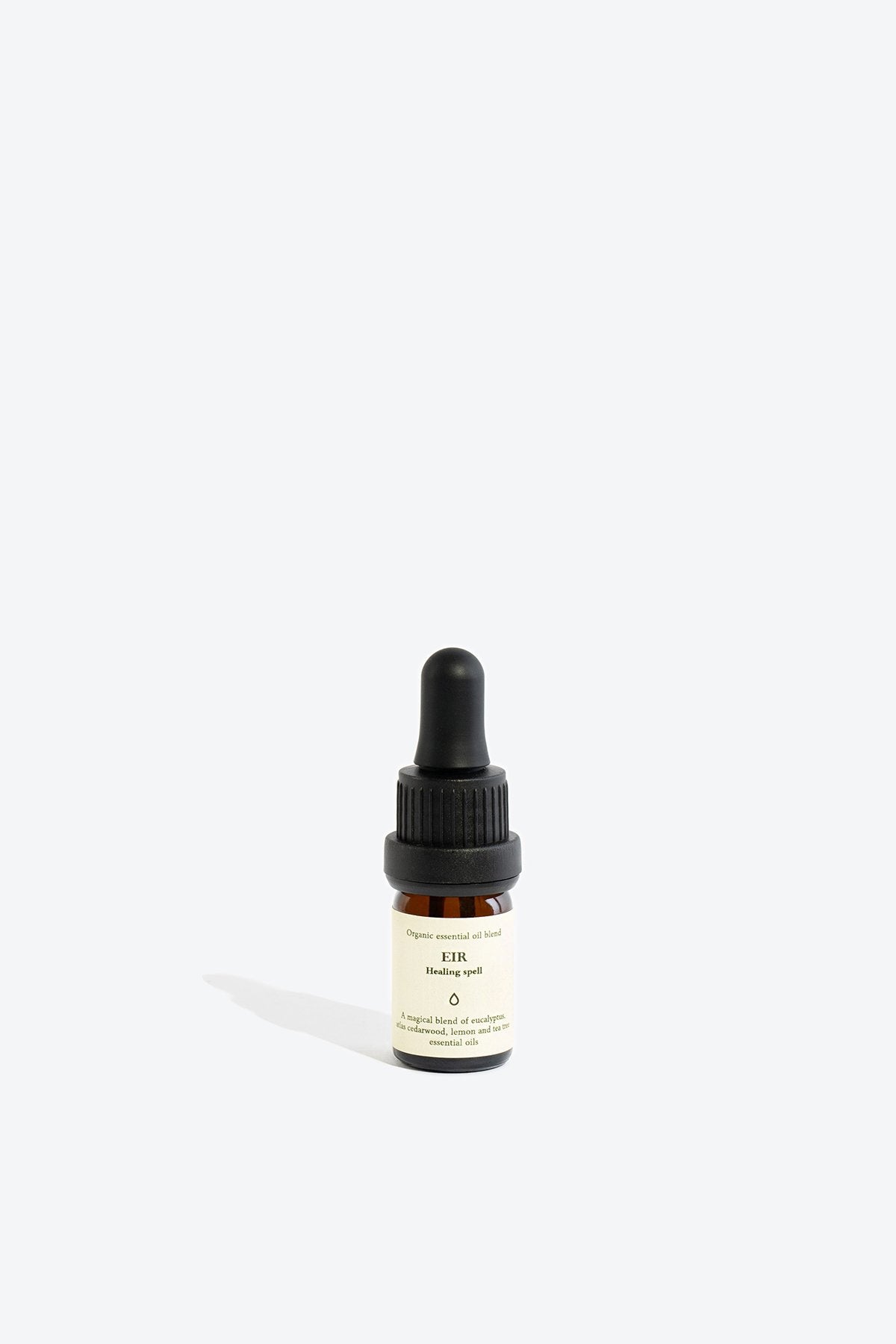 1. Smells Like Spells Essential Oil Blend EIR in 5 ml glass bottle with pipette, studio shot