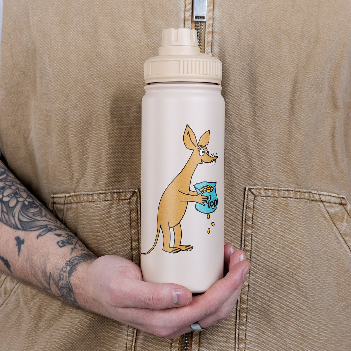 1. Sniff Thermal Everyday Bottle by Moomin held by a person, showcasing the playful design and practical size