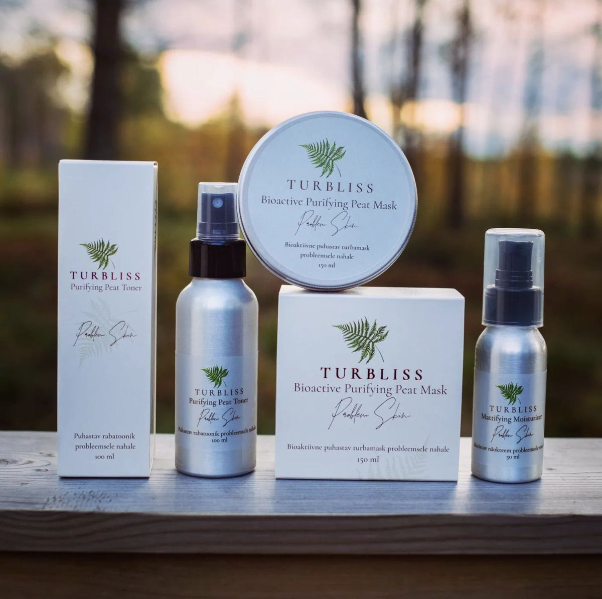 3. Turbliss skincare collection including Purifying Bog Tonic and Peat Mask displayed outdoors