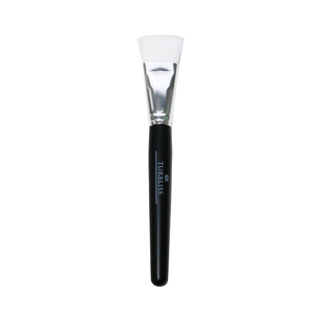 2. Studio image of Turbliss vegan mask brush with black handle and white bristles