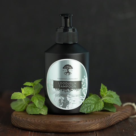 1. HOIA homespa Organic Shampoo Peppermint & Bergamot 200ml bottle with mint leaves, shown on wooden surface