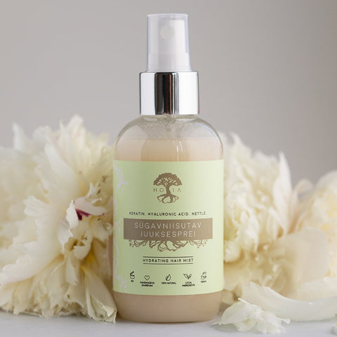 1. HOIA homespa Deep Moisturising Hair Spray 100ml with nettle and hyaluronic acid, shown with white flowers