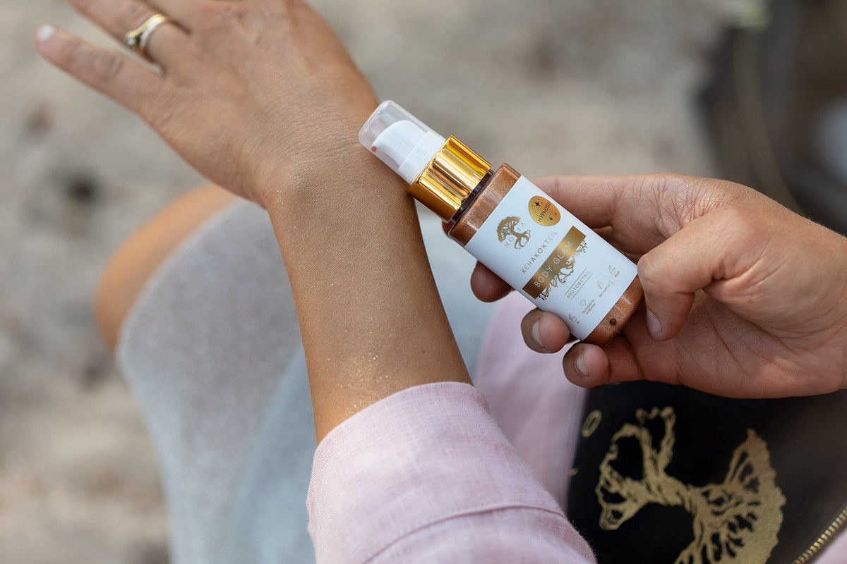 10. Close-up of HOIA homespa Body Cocktail Body Glam applied on hand, showing shimmering effect