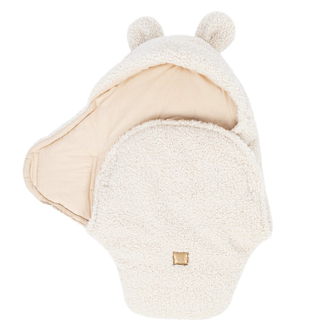 2. Cream baby swaddle with bear ears, side view showing open design and soft boucle texture