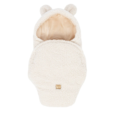1. Cream baby swaddle with bear ears, shown from top view, featuring soft boucle material and velcro closure