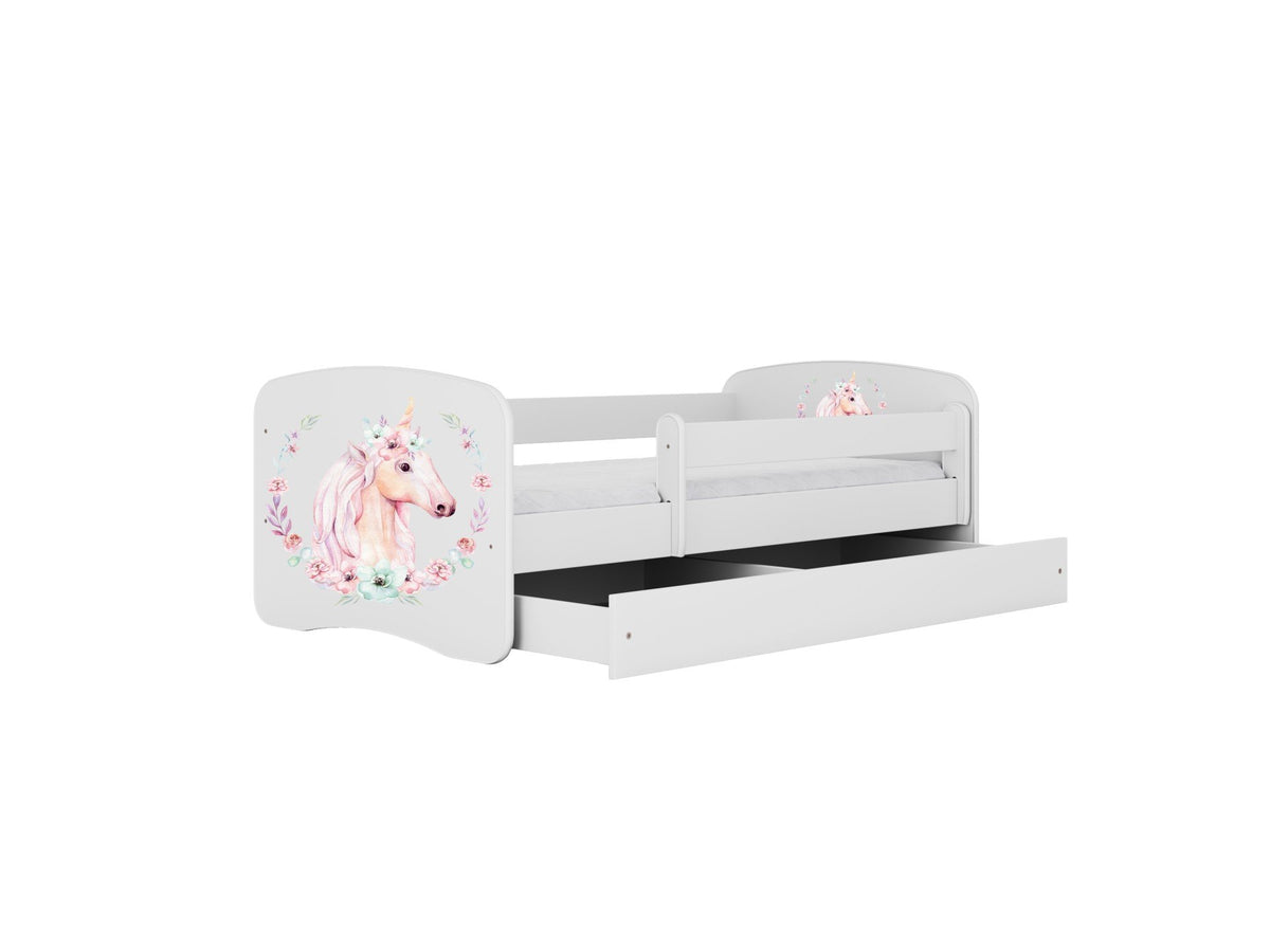 3. White children's bed with unicorn design, shown with open drawer for storage