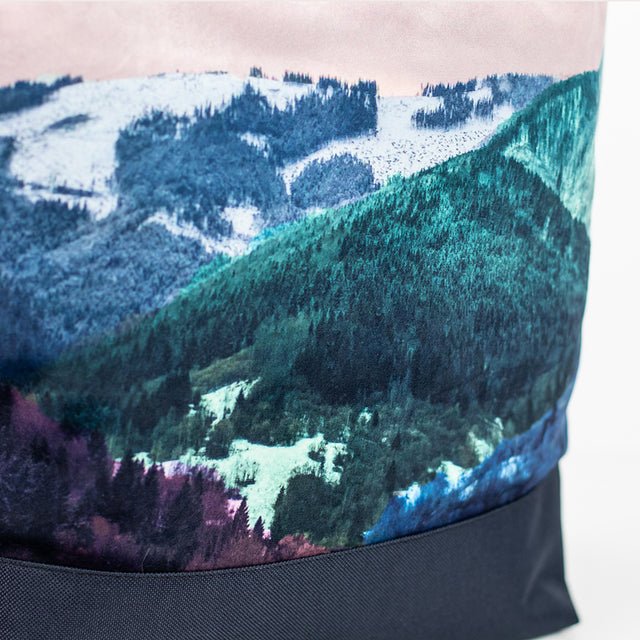 6. Close-up of Muni Blue Mountains backpack's printed mountain design on velvet fabric