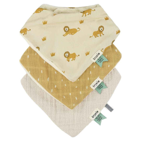 1. Set of three Trixie Baby bandana bibs including lively lion print, mustard yellow, and beige solid colors, made from organic cotton muslin