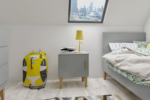 1. Grey bedside table with solid oak legs in bright attic bedroom with city view