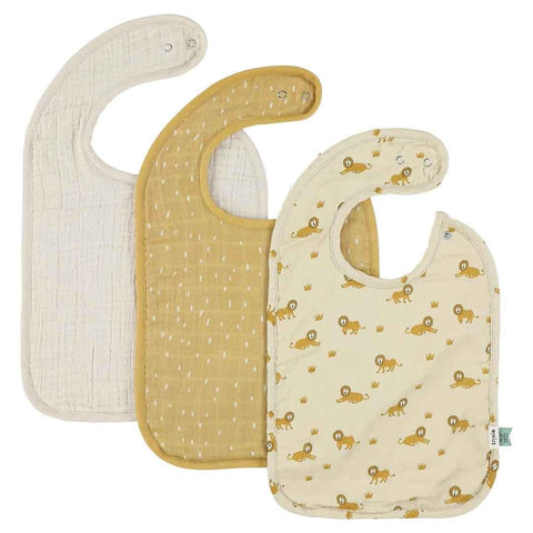 1. Set of three baby bibs including a lively lion print and two solid colors in beige and mustard, made from organic cotton muslin with adjustable snaps