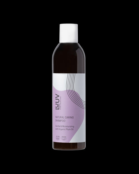 3. Studio image of LUUV Natural Nourishing Shampoo with Plum Oil, 250 ml, against black background