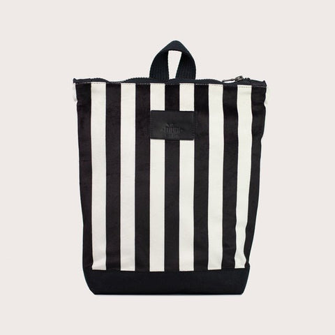 4. Studio shot of Muni black and white striped kids backpack with velvet top and polyester bottom