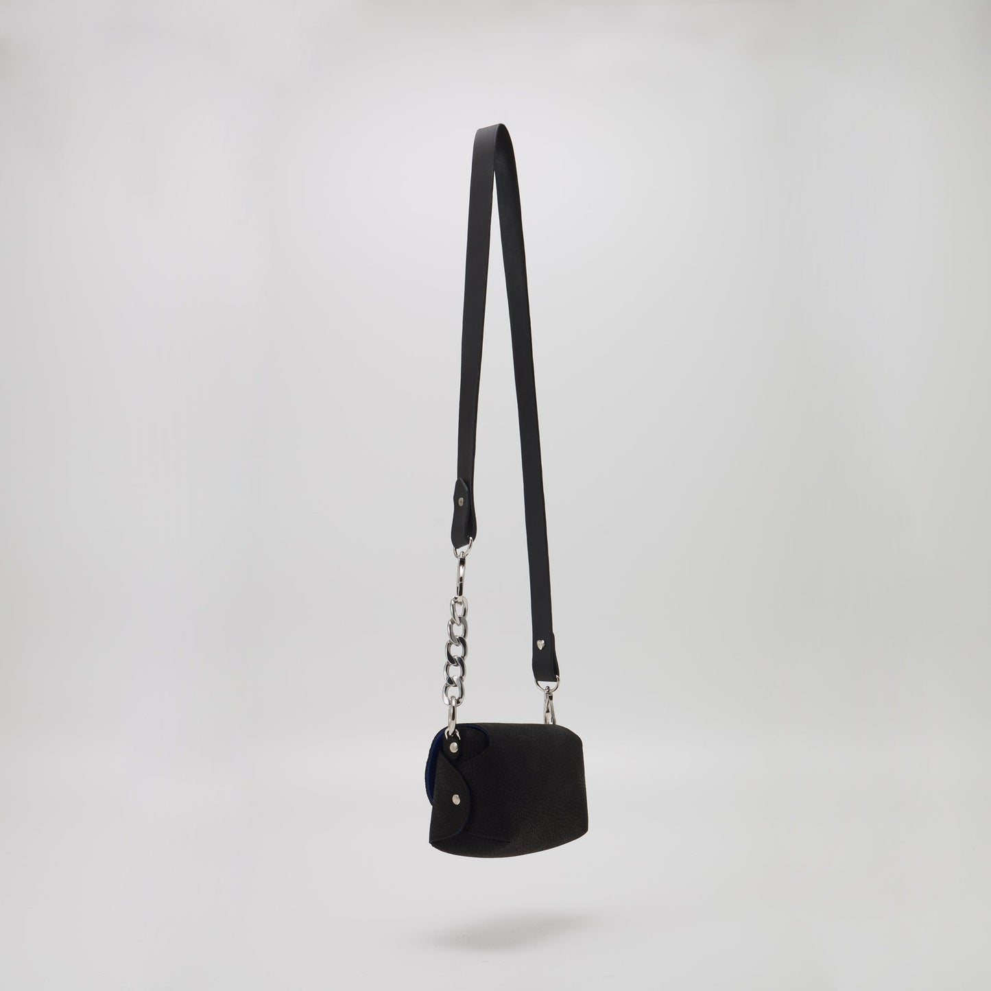 8. Close-up of textured leather on Daz Studio shoulder bag, highlighting craftsmanship