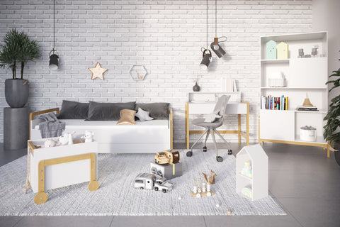 1. Kocot Kids Victor bookshelf in a child's room with Scandinavian decor, featuring toys and books on shelves, against a white brick wall